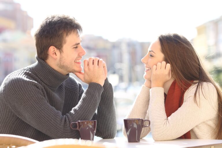 smiling couple looking each other