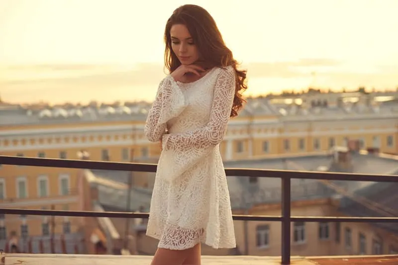 attractive woman in white dress