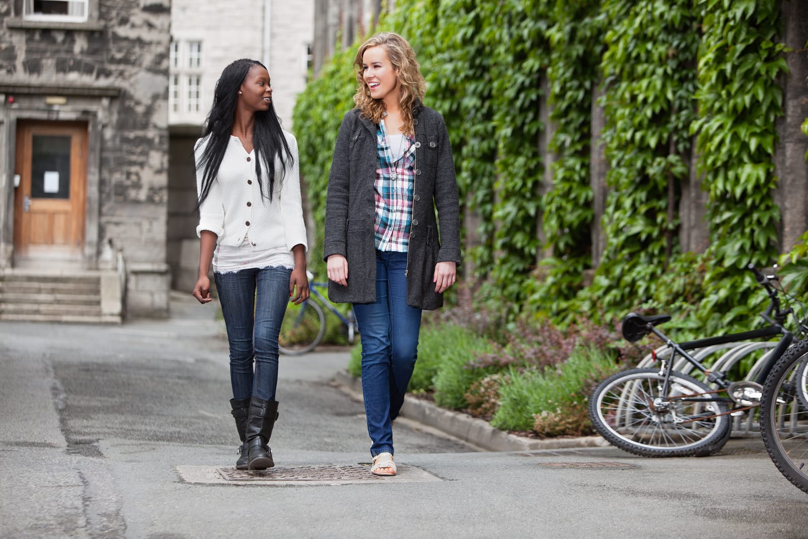 friends having a casual chat while walking on street