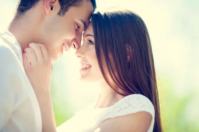 smiling couple looking at each other