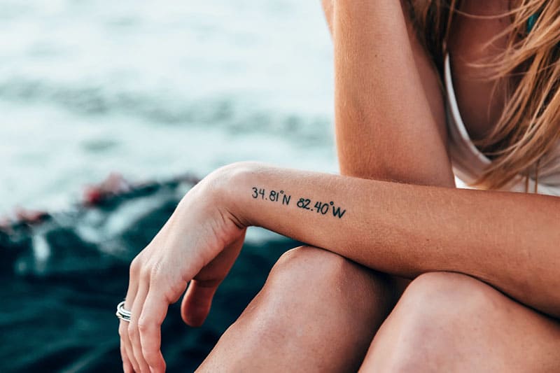 woman with tattoo on her hand