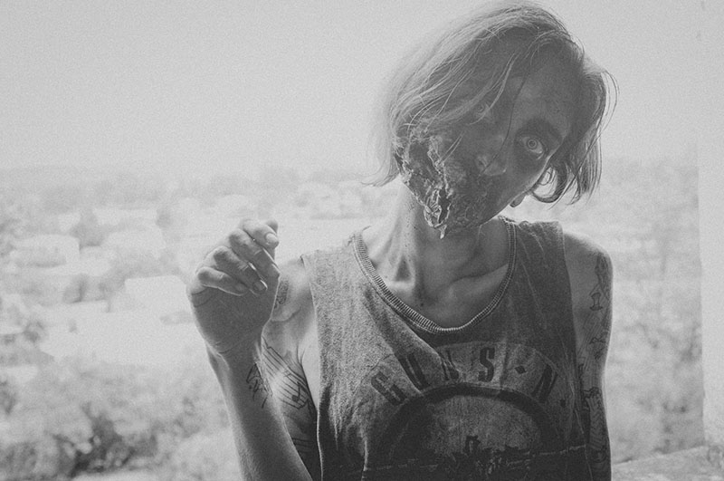 woman zombie posing at camera