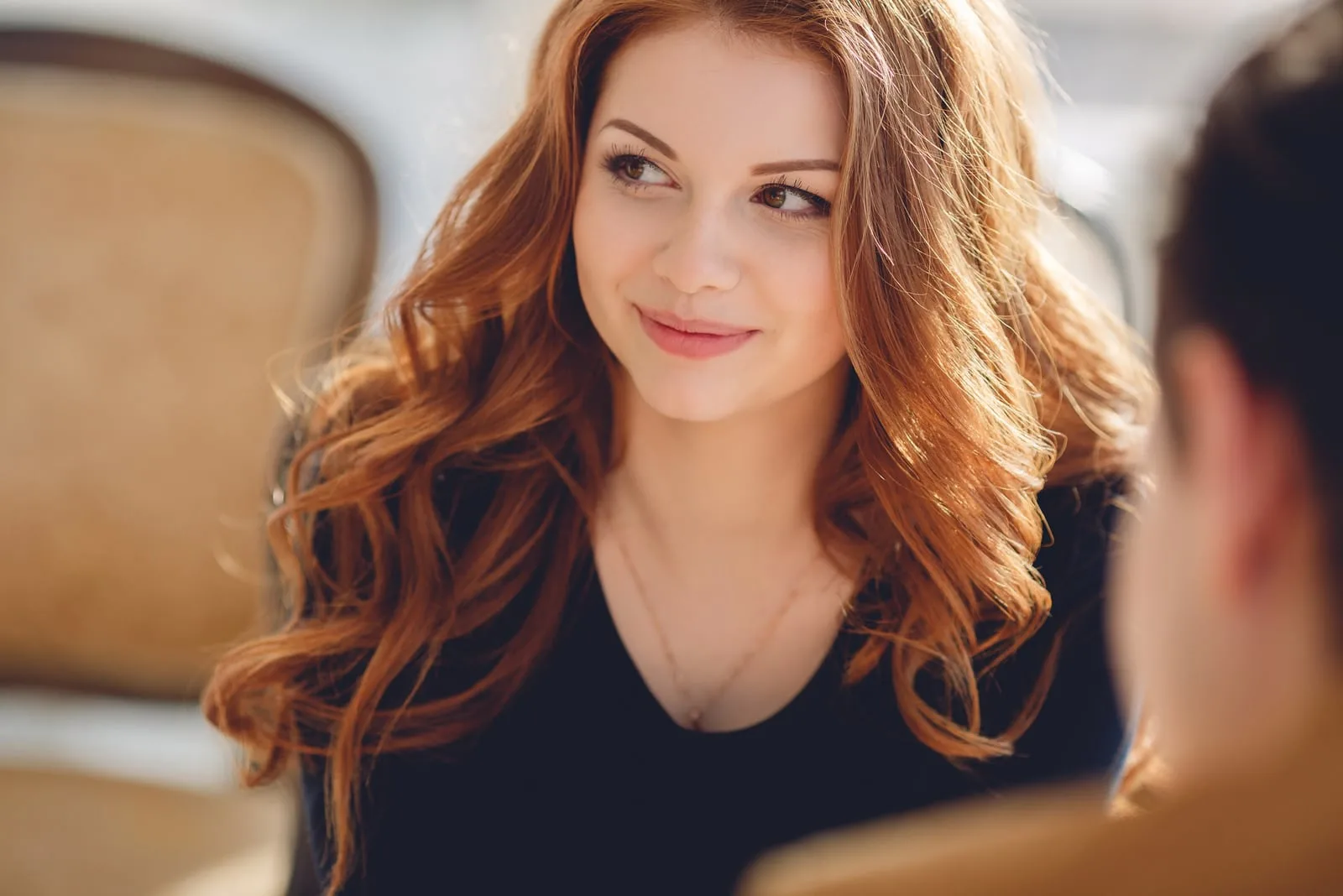 beautiful brunette drinking coffee with a man