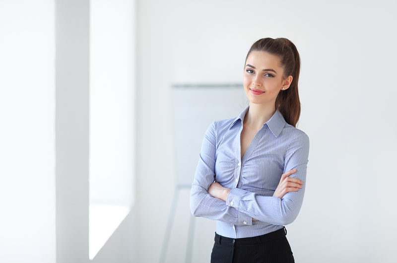 young woman in shirt posing