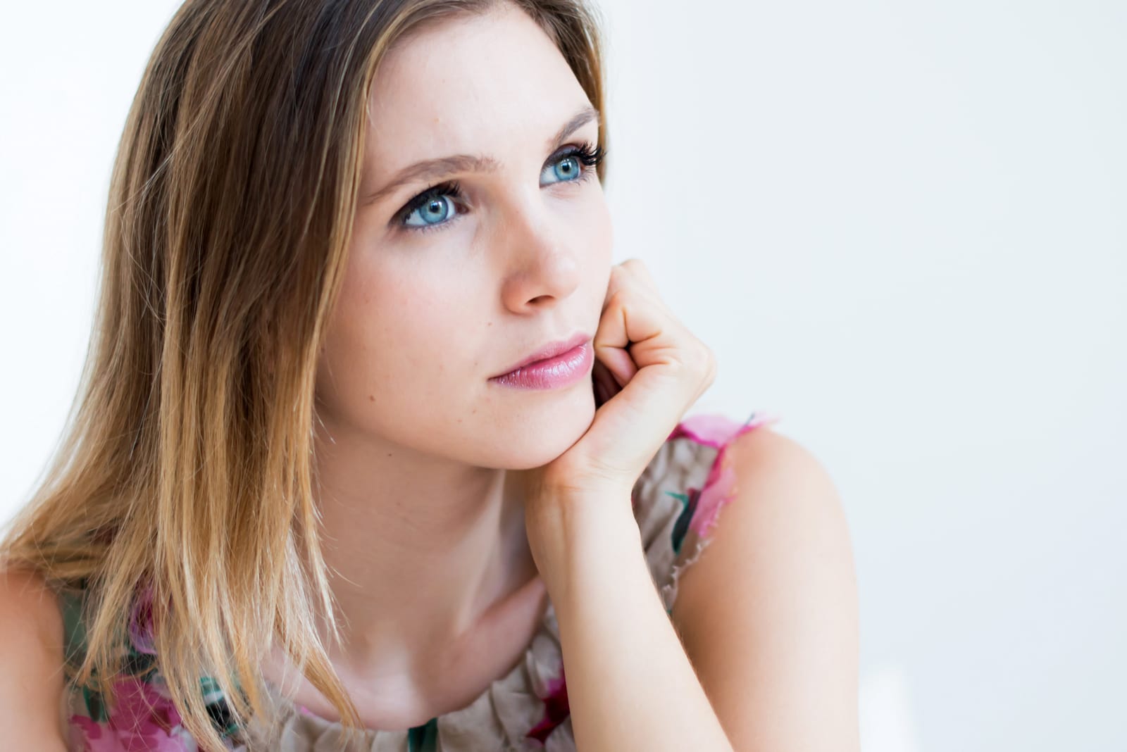 serious blond woman looking at distance