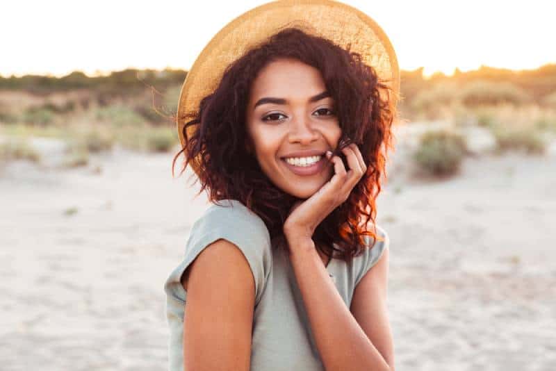 Portrait of woman in summer straw hat