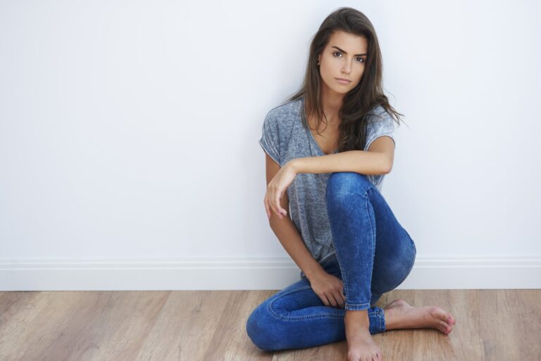 beautiful woman sitting on the floor