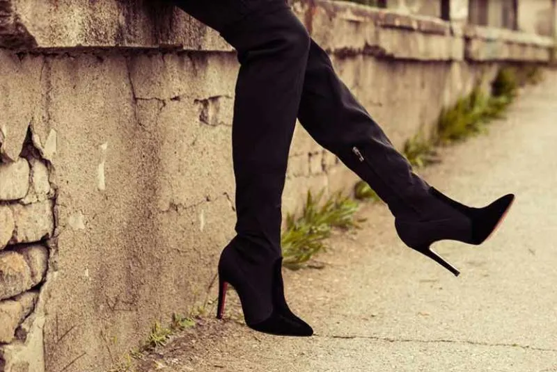 close up photo of woman wearing heels