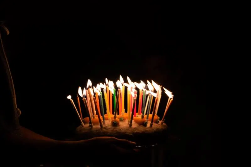 lighted candles on cake