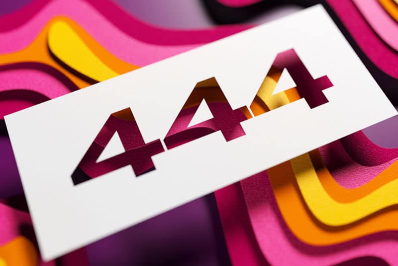 number 444 on white paper