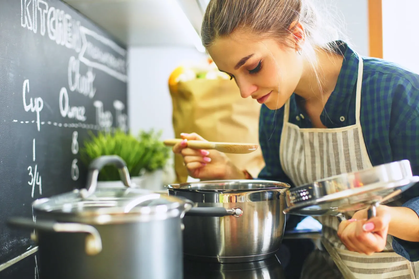 woman cooking in her kitchen