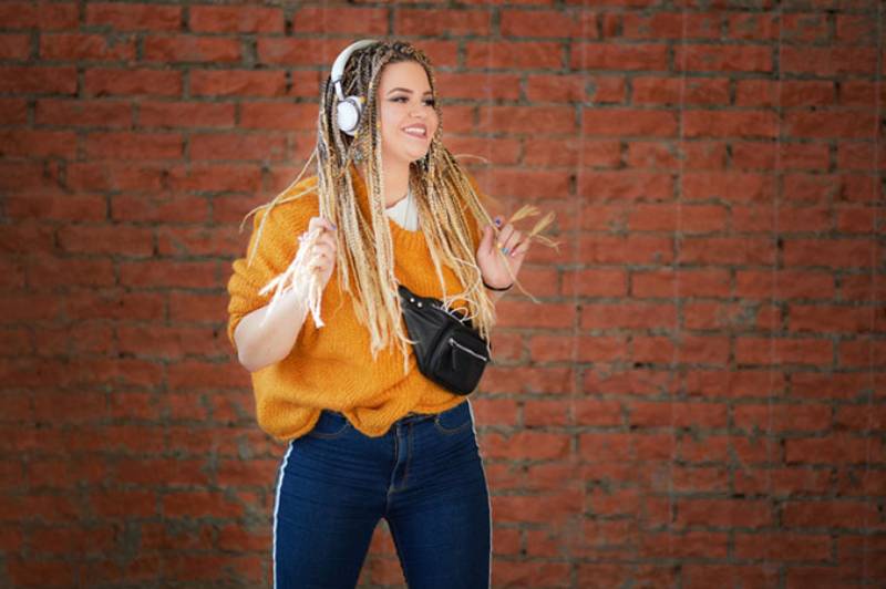 woman listening to music and dance