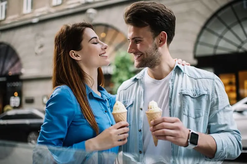 young couple having an ice cream