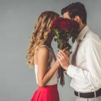 couple holding roses
