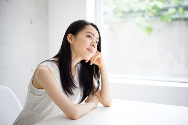 young woman thinking