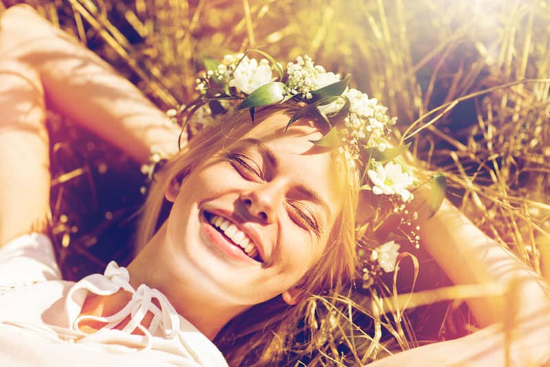 beautiful woman smiling in sunlight