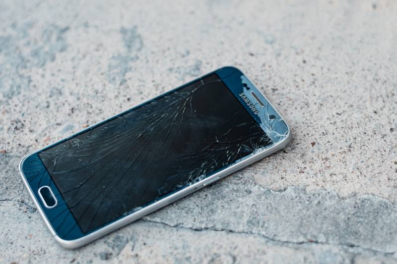 broken smartphone on the ground