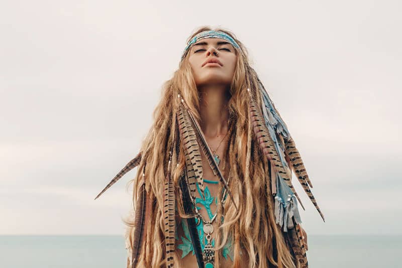 calm hippie woman meditates