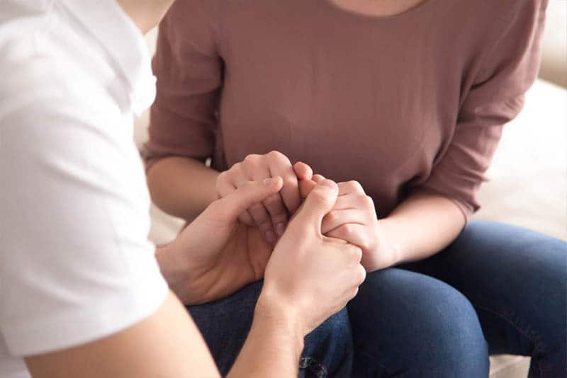 couple holding hands