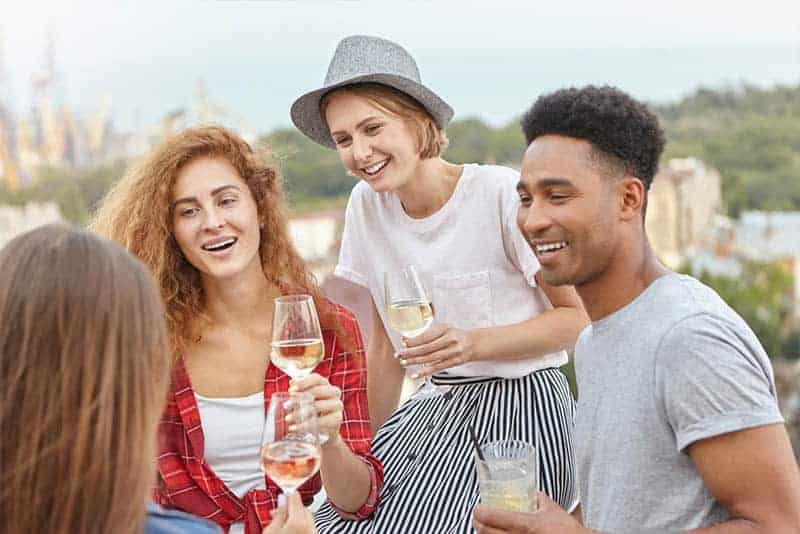 group of friends holding champagne glasses