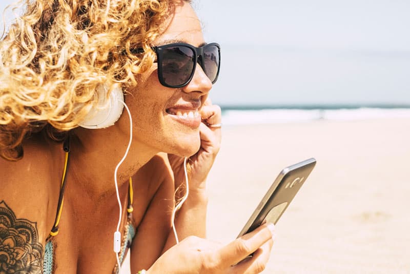 happy woman listening to music