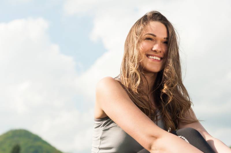 portrait of smiling woman outdoors