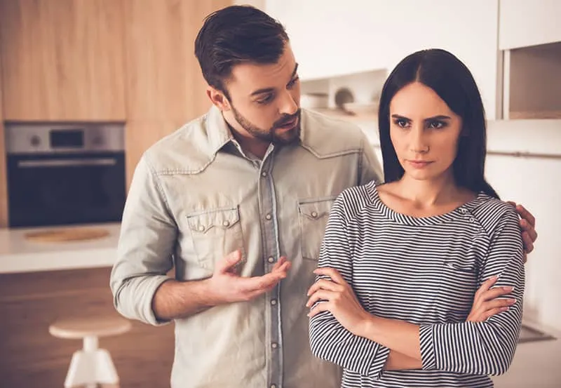 upset woman doesn't want to listen her man while talking