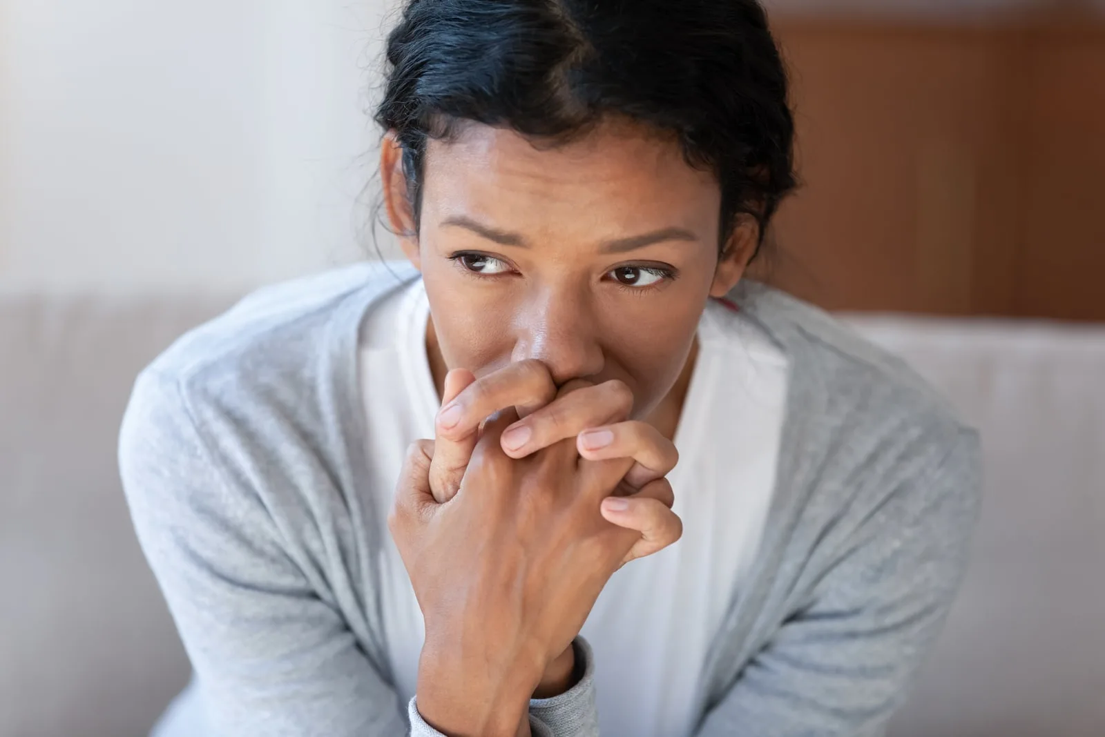 woman look in distance thinking pondering