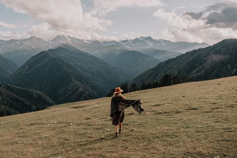 young woman walking in nature