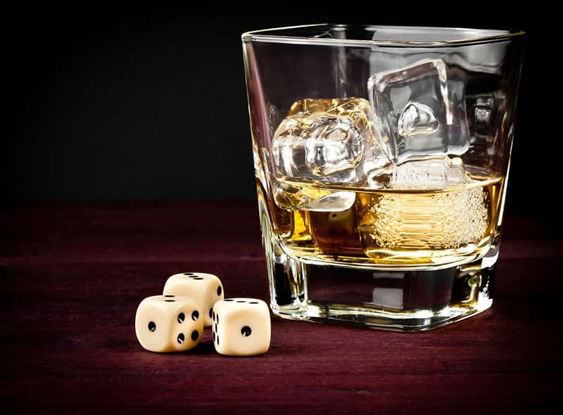 The Top 13 Fun, Sexy And Daring Drinking Games For Couples