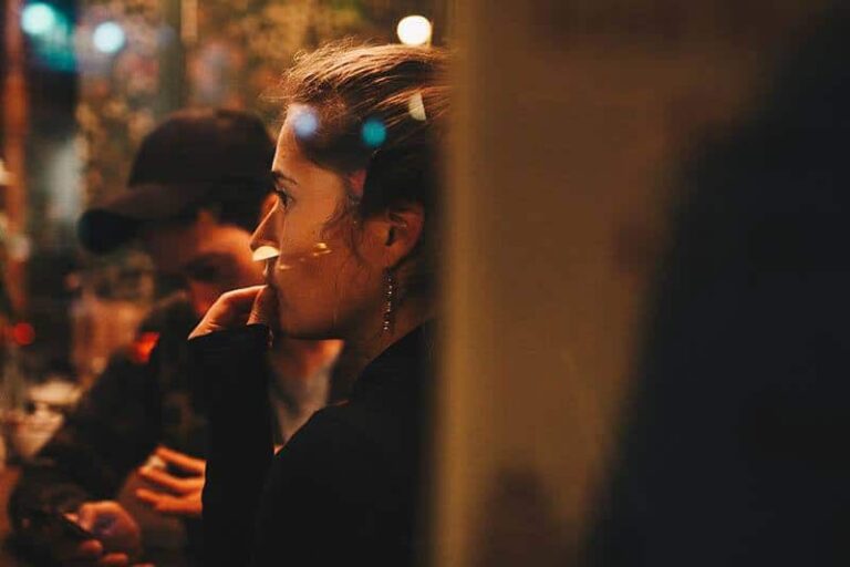 side view of woman in cafe