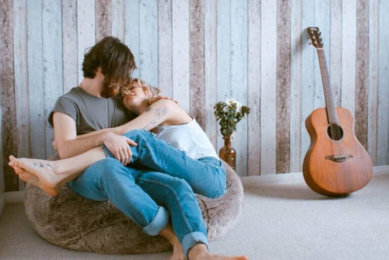 a woman in the arms of a man