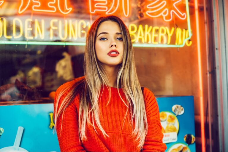 Beautiful caucasian girl with red lips makeup
