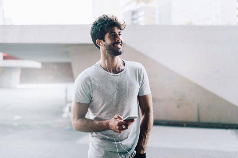 handsome man listening to music