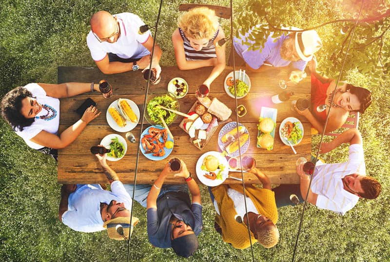 family having garden dinner