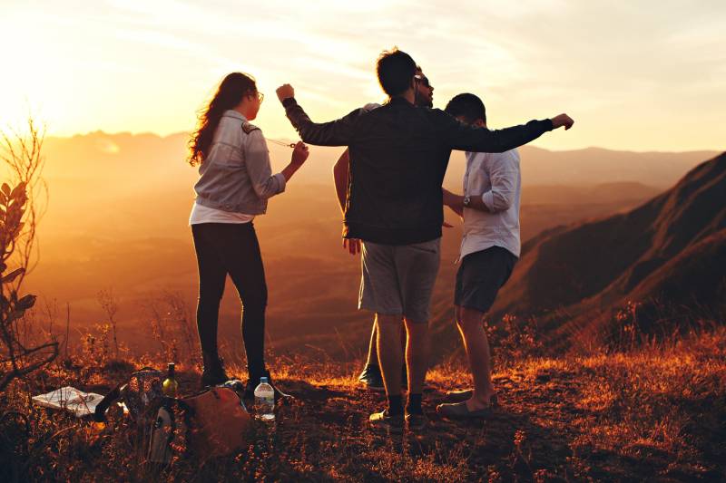 group of friends surrounded by nature