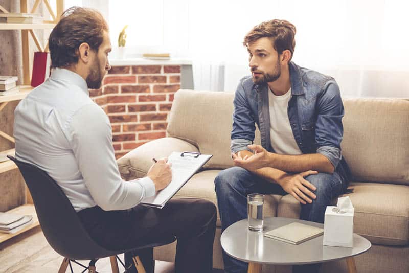 man talking to therapist