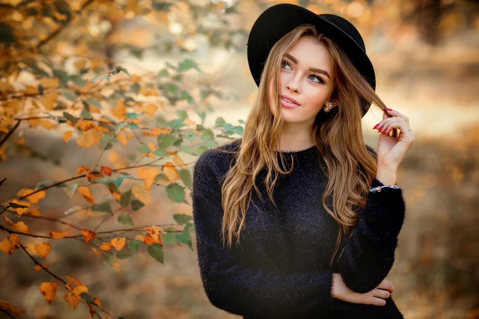 portrait of a Beautiful girl in dark dress