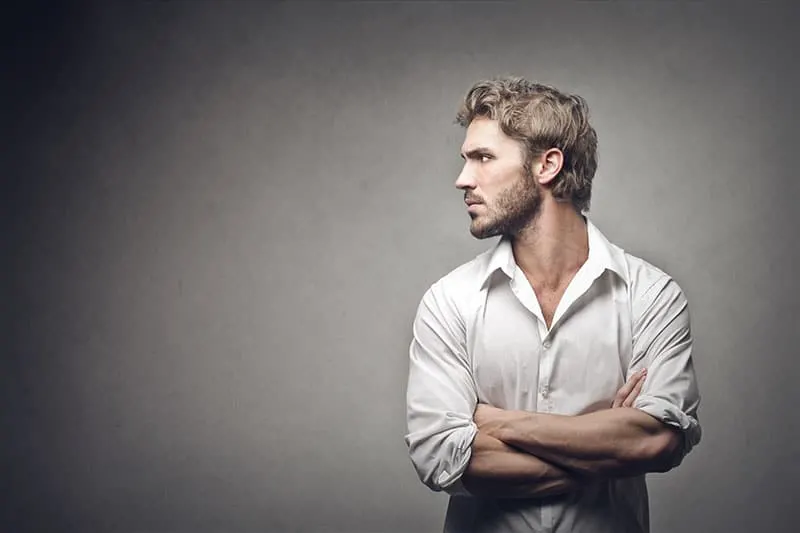 profile of handsome man on gray background