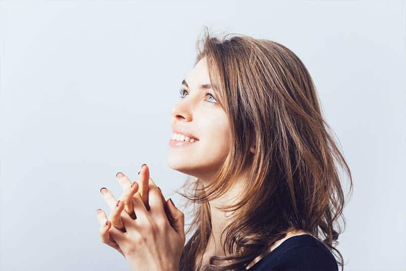 smiling woman looking up