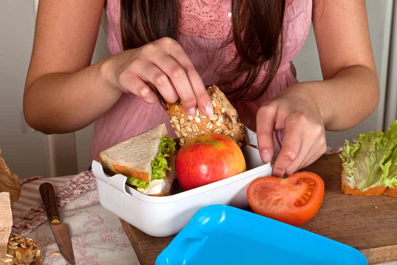 woman packing lunch