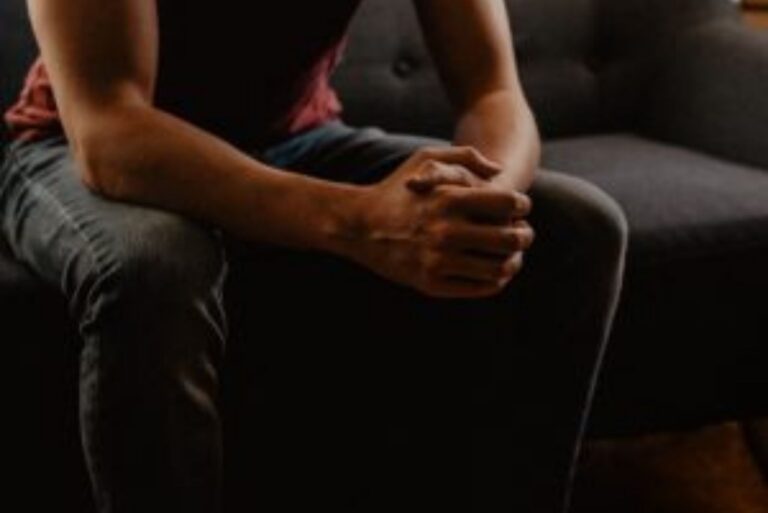 a man sitting on a couch