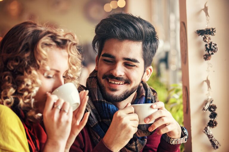 couple sitting drinking coffee