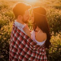 couple in love standing in blanket outdoor