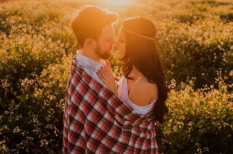 couple in love standing in blanket outdoor
