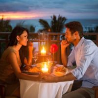 romantic couple having dinner date at night