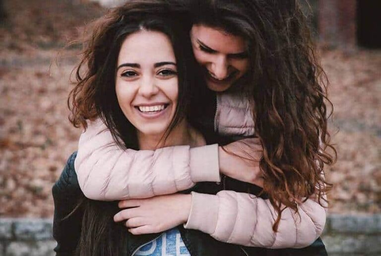 two happy female friends