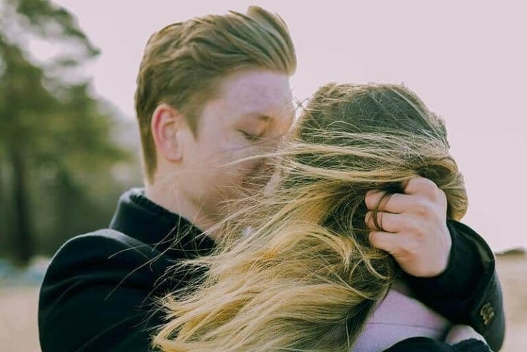 the man hugged the woman