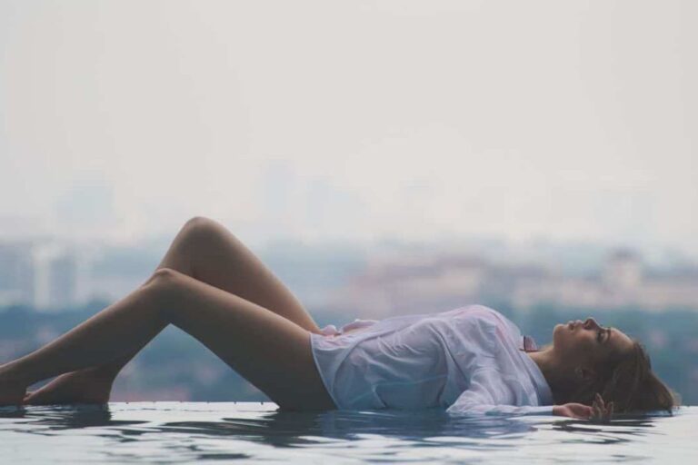 the woman lies on the water
