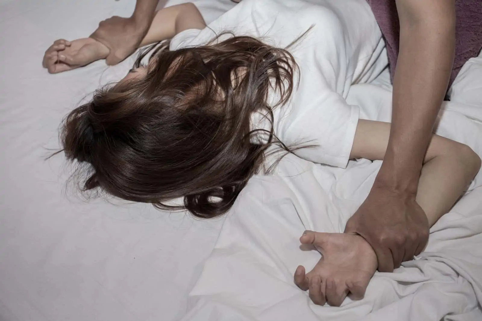 a man abuses a girl